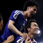 Milésimo jogo da Copa do Mundo com jogadores do Japão comemorando gol contra a Tunísia